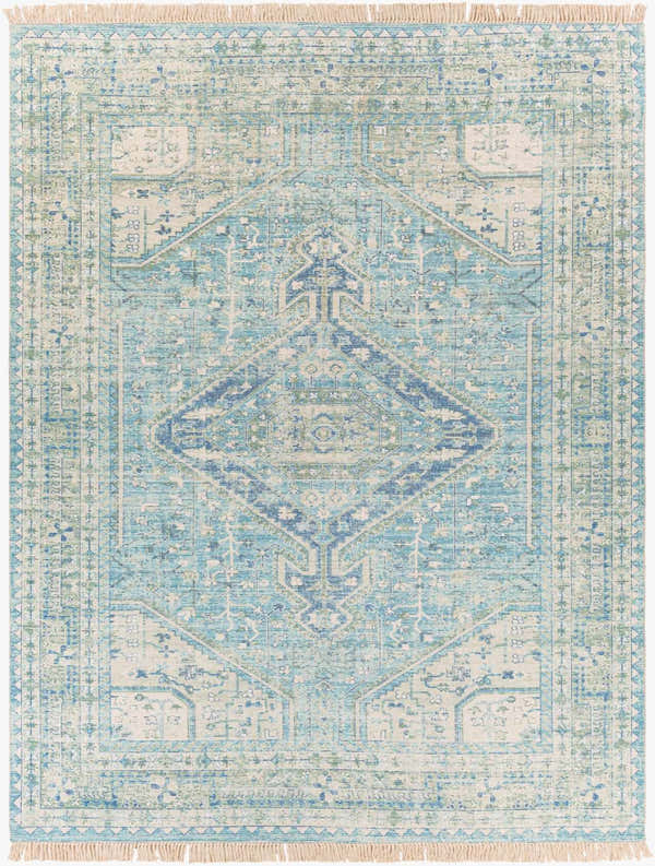Close-up of Byers Handmade Cotton-blend Aqua Rug. Features traditional geometric patterns in aqua, green, and blue hues. Hand woven texture. Design-Rectangle