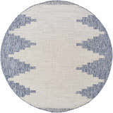Close-up of a round Djugun Blue Outdoor Rug. The rug has a geometric pattern in blue and off-white. Design-Round-67