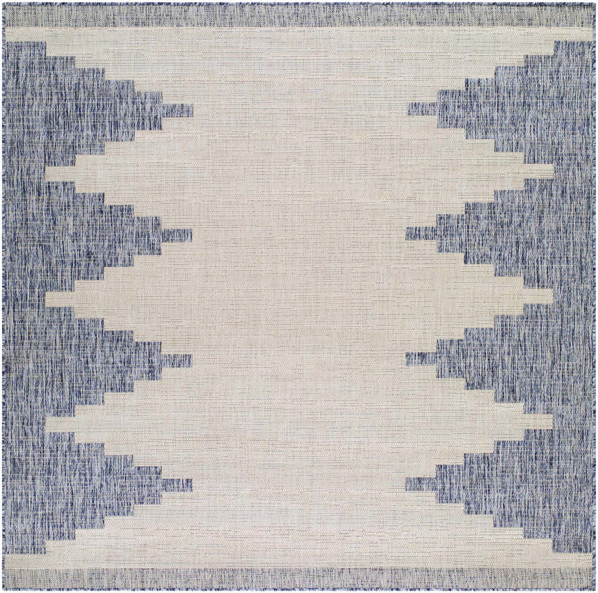 Close-up of the Djugun Blue Outdoor Rug. Bohemian style rug with blue and off-white geometric pattern. Design-Square-67