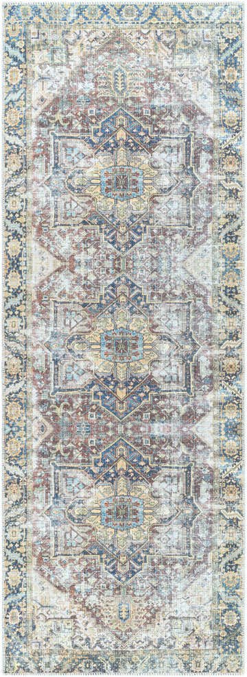 Close-up of the Blue Catigpian Distressed Washable Area Rug. Features Persian-inspired design in dark gray, brown, and nutmeg hues. Design-Runner-2773