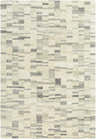 Close-up of the Max Handmade Becki Owens x LIVABLISS rug. Hand-tufted wool rug in blue, charcoal, dove gray, and ivory. Contemporary style. Design-Rectangle-576