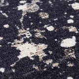 Close-up of the Janek Handmade Galey Alix x LIVABLISS GAJA-2300 Area Rug. Charcoal, ivory, and taupe abstract pattern. Texture