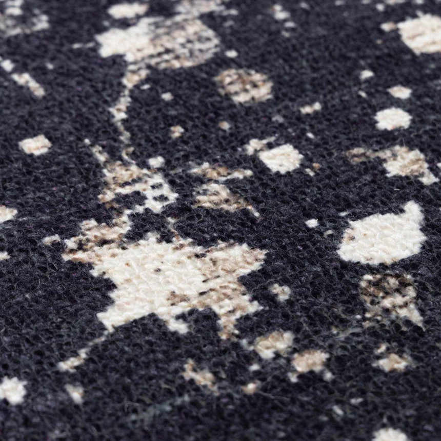 Close-up of the Janek Handmade Galey Alix x LIVABLISS GAJA-2300 Area Rug. Charcoal, ivory, and taupe abstract pattern. Texture