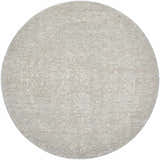 Close-up of a round Catrin Area Rug. Light sage, light slate, and slate blue traditional farmhouse design. Design-Round-53