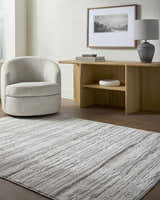 Living room scene with neutral decor and Cardea Area Rug in cream, ivory, and gray. Contemporary style. Roomscene-Rectangle