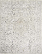 Close-up of the Corina Charcoal Area Rug. Traditional floral design in charcoal, cream, gray, and tan. Machine woven texture. Design-Rectangle-710102