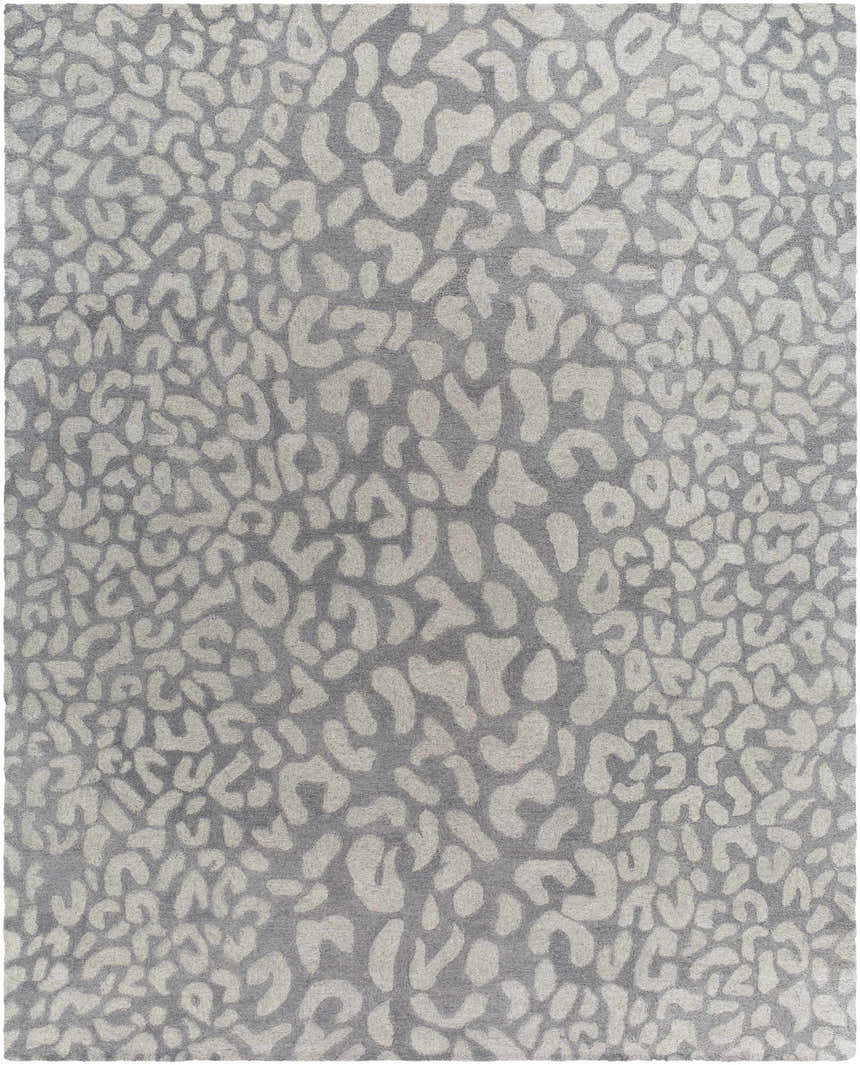 Close-up of the Circa Leopard Print Area Rug, a hand-tufted wool rug in beachhouse and beige colors. Contemporary style. Design-Rectangle-810