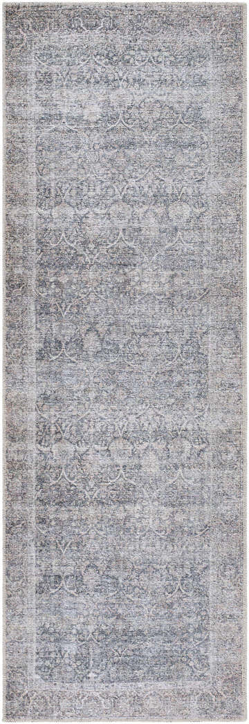 Close-up of Charla Washable Area Rug. Machine woven polyester rug in beige, gray, and tan with a traditional farmhouse pattern. Design-Runner-27710