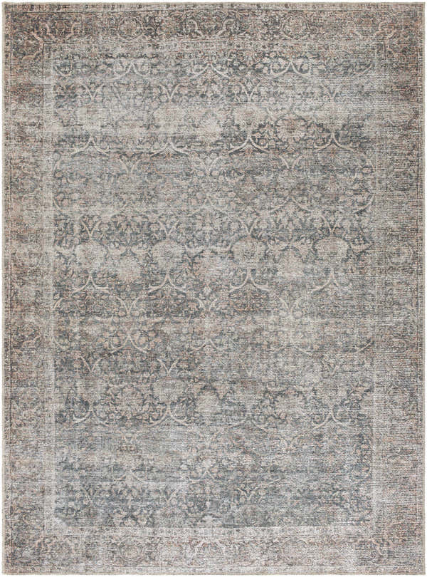 Close-up of the Charla Washable Area Rug. Machine woven polyester rug in beige, gray, and tan with a traditional pattern. Design-Rectangle-679