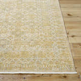Close-up of the Becki Tan Owens x Livabliss Renaissance Area Rug. Beige, tan, and taupe farmhouse style wool rug. Front
