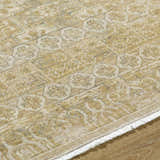 Close up of Becki Tan Owens x Livabliss Renaissance Area Rug. Beige, tan, and taupe wool rug with traditional pattern. Texture