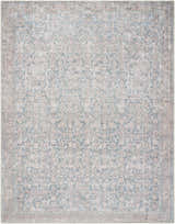 Close-up of the Crevan Washable Area Rug. Machine-woven polyester rug in denim, tan, and light sage with a traditional pattern. Design-Rectangle-710102