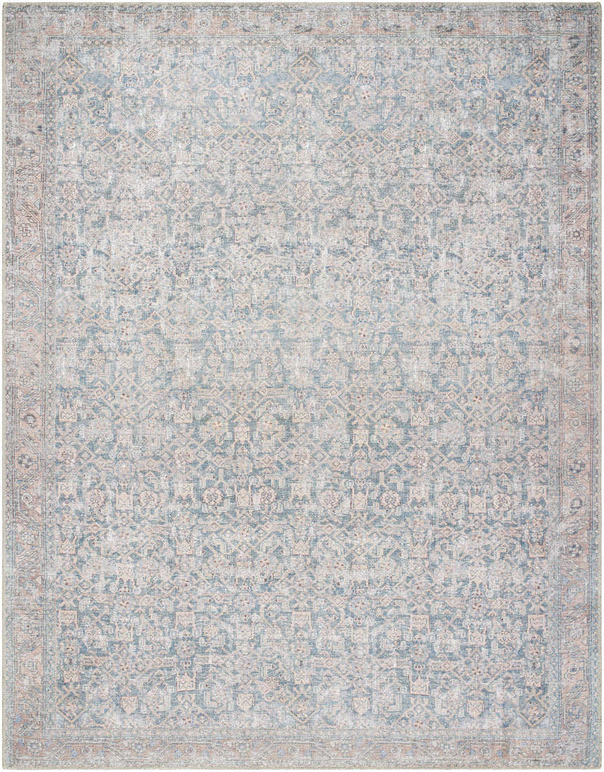 Close-up of the Crevan Washable Area Rug. Machine-woven polyester rug in denim, tan, and light sage with a traditional pattern. Design-Rectangle-710102