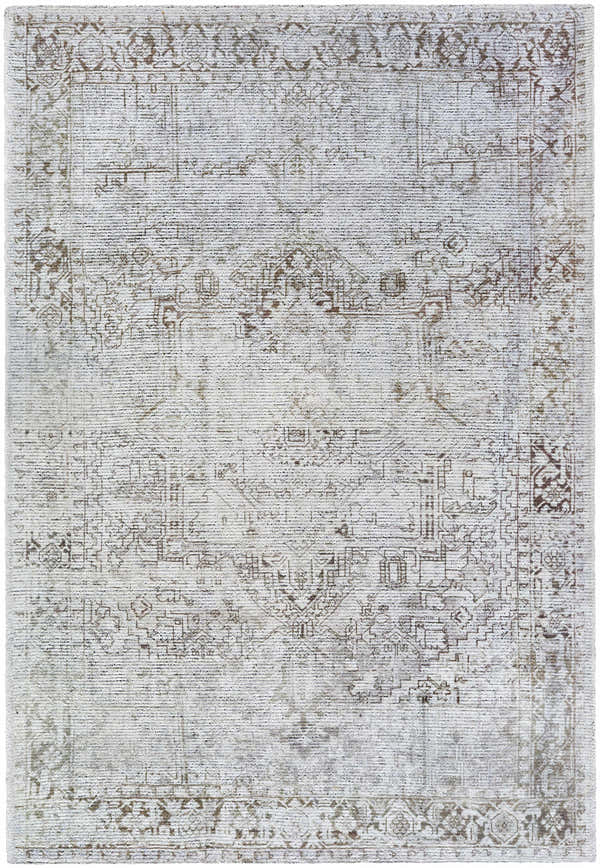 Close-up of the Clodia Area Rug. Hand-tufted polyester rug in charcoal, ivory, silver gray, and taupe with a traditional pattern. Design-Rectangle-576