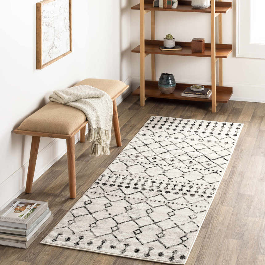 Entryway with Scandi Moroccan Trellis Rug runner, wood bench, and shelf styled with books and decor. Roomscene-Runner