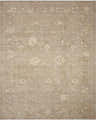 Close-up of the Fetscher III Vintage Damask Area Rug. Light brown rug with ivory damask pattern and subtle texture. Design-Rectangle