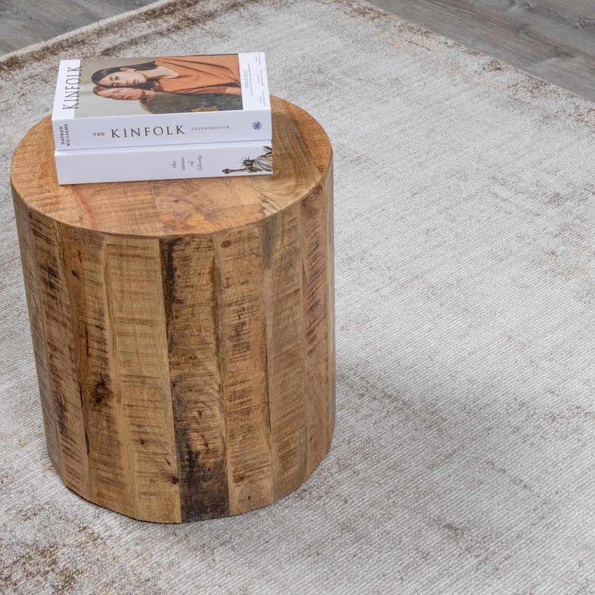 Close-up of the Myrtle Avenue Galey Alix x LIVABLISS rug, showing its subtle pattern and texture next to a wood side table. Styleshot