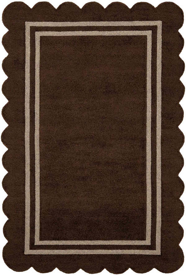 Close-up of the hand-tufted Chogan Chocolate Brown Area Rug. Features a scalloped edge and double border. 100% wool rug. Design-Rectangle