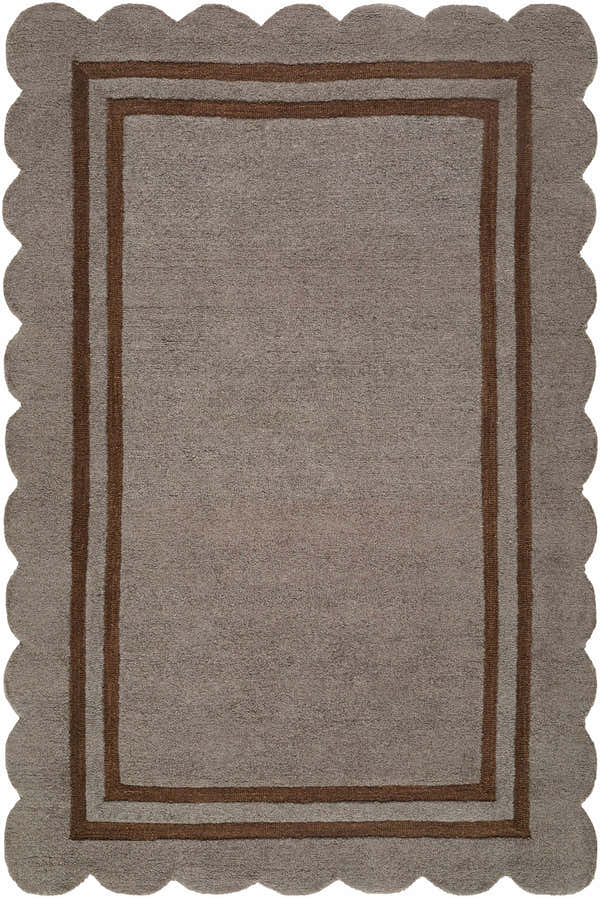 Close-up of the hand-tufted Chogan Charcoal Area Rug. Features a scalloped edge and brown border on a textured gray wool rug. Design-Rectangle-576