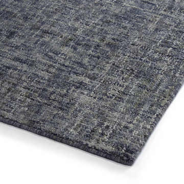 Close up of the hand-tufted Dalyn Calisa CS5 Carbon Area Rug showing its texture, blue and carbon colors.