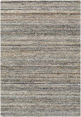Close-up of the hand-tufted Capote Tan Area Rug. Features ash, charcoal, slate blue, tan, and taupe hues in a horizontal stripe design. Design-Rectangle-576
