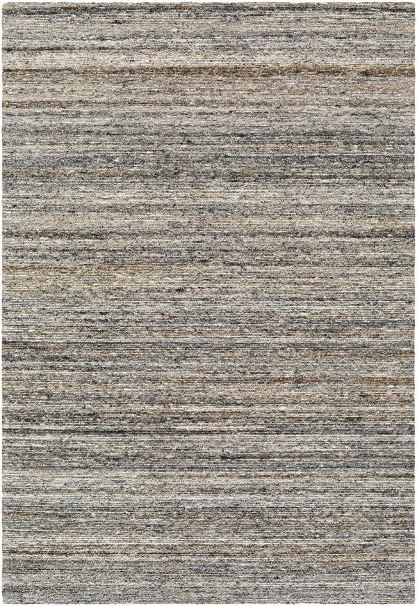Close-up of the hand-tufted Capote Tan Area Rug. Features ash, charcoal, slate blue, tan, and taupe hues in a horizontal stripe design. Design-Rectangle-576