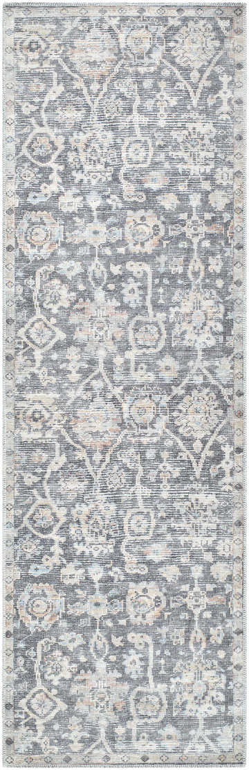 Close-up of the Cheick Washable Area Rug - Vivir x Livabliss. Navy, off white, and orange traditional floral pattern. Design-Runner-27710