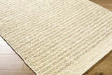 Close-up of the hand woven Arlais Striped Area Rug. Ash, desert sand, pearl, and warm gray wool stripes. Corner