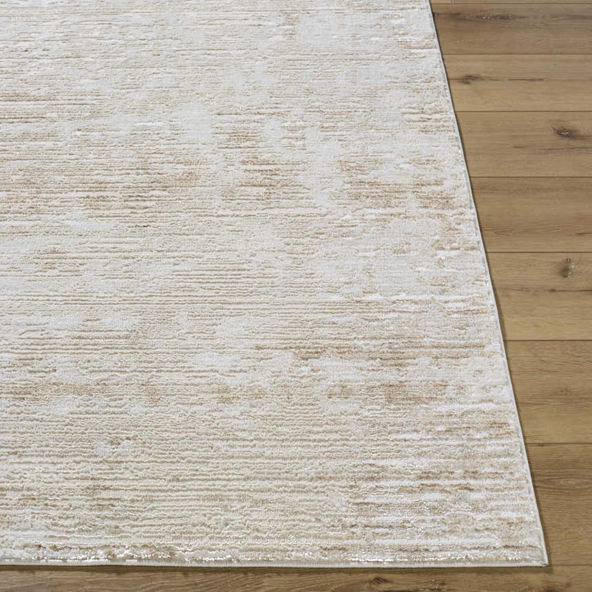 Close-up of the Candie Beige Area Rug showing its cream, beige, and tan textured design on wood floors. Front