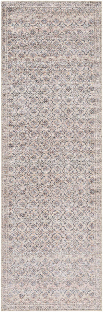 Close-up of the Agrata Washable Area Rug. Beige rug with a traditional floral pattern in burnt orange, charcoal, cream, and gray. Design-Runner-27710