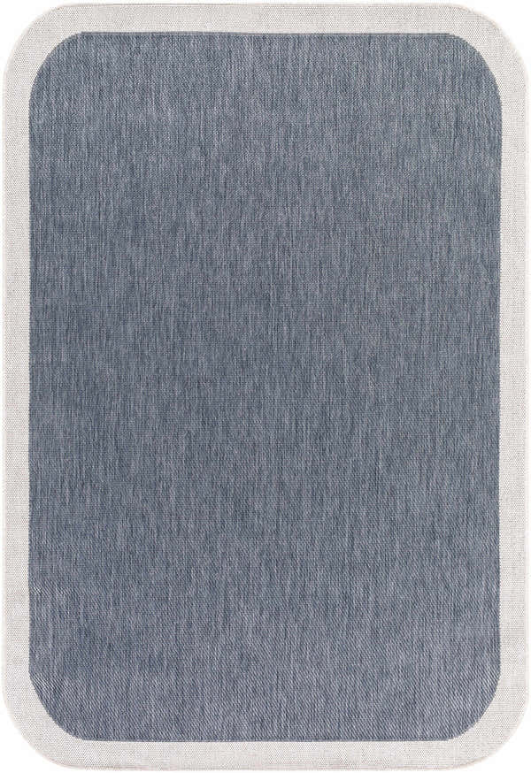 Close-up of the Chetan Blue Outdoor Rug. Features a textured blue weave and a cream border. Design-Rectangle-537