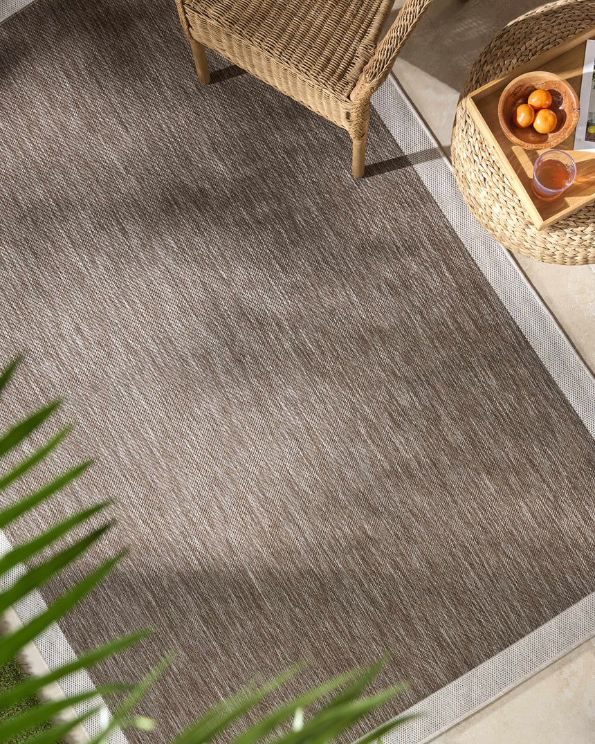 Chetan Dark Brown Area Rug