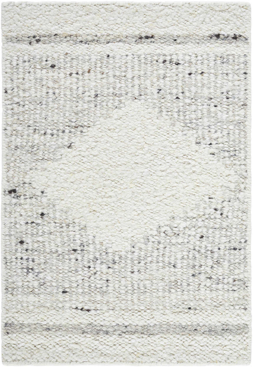 Close-up of Ethara Ivory Charcoal rug. Hand-woven wool rug with global bohemian tribal pattern and textured feel. Design-Rectangle-23