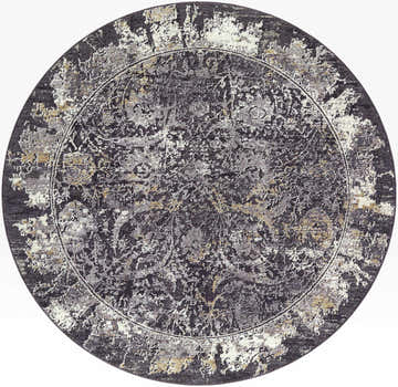 Close-up of round Abiram Area Rug. Charcoal, gray, and ivory distressed traditional pattern. Farmhouse style polyester rug. Design-Round-53