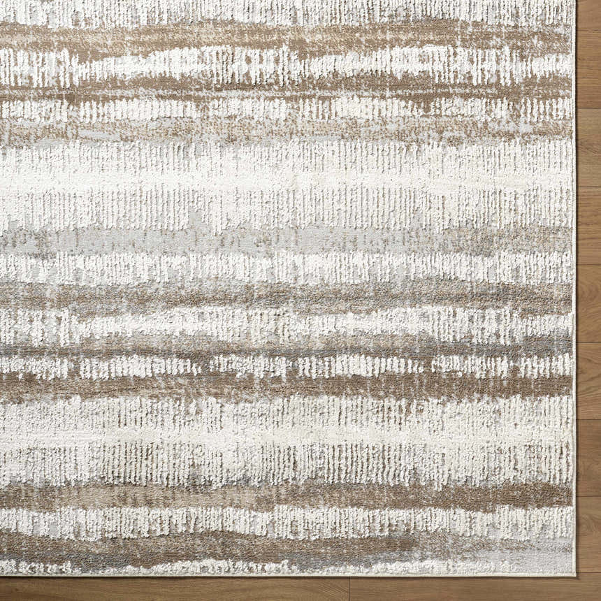 Close up of the Asmara Brown Area Rug showing its ash, pearl, and brown horizontal stripe pattern. Corner
