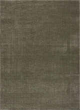 Close-up of the Leanna Green Washable Area Rug, featuring a subtle geometric pattern in shades of gray and green. Design-Rectangle