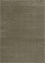 Close-up of the Kazuma Green Washable Area Rug, featuring a subtle geometric pattern and soft gray-green hues. Design-Rectangle