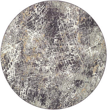 Close-up of the round Aolani Medium Gray Area Rug, featuring a Southwestern-inspired pattern in black, gray, ivory, and tan. Design-Round-53