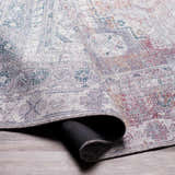 Close-up of the Livabliss Colin Surya CLN-2304 rug, showcasing its charcoal, cream, and red traditional pattern and machine-woven texture. Fold