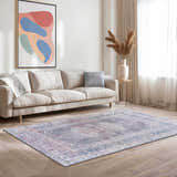 Living room with a beige sofa and Livabliss Colin CLN-2304 rug in charcoal, cream, and red tones. Roomscene-Rectangle