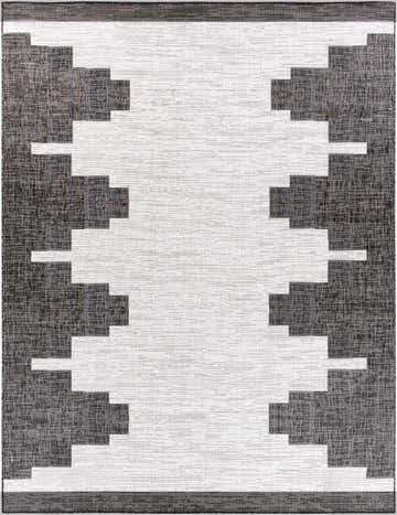 Close-up of the New Djugun Area Rug. Black, charcoal, and off-white geometric Southwestern design. Design-Rectangle