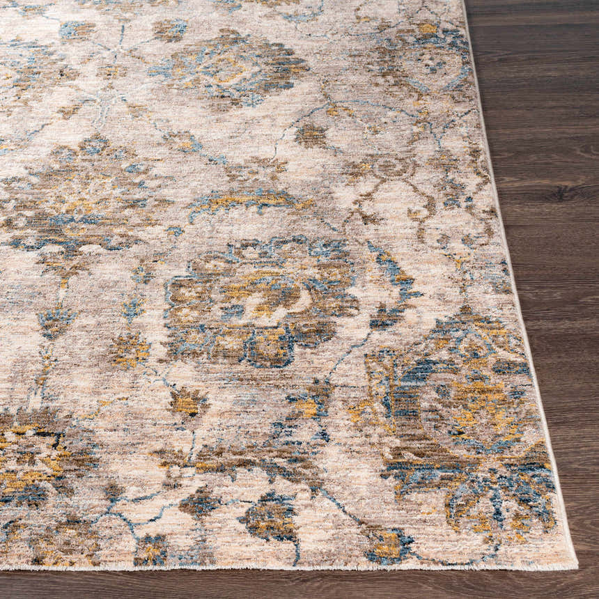 Close-up of the Morinville Teal Floral Rug, showcasing its brown, teal, and mustard floral pattern and soft texture. Front