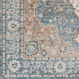 Close-up of the Edremit Area Rug showing its traditional oriental pattern, cream, blue, and brown colors. Swatch
