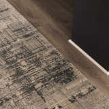 Close-up of the Eltham Thick Luxe Rug in taupe and black, showing its contemporary distressed pattern and soft texture. Roomscene-Rectangle