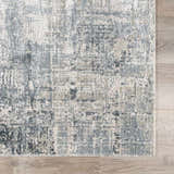 Close up of the Eltham Thick Luxe Rug. Abstract design in dusty sage, light gray, and taupe. Machine woven texture. Swatch