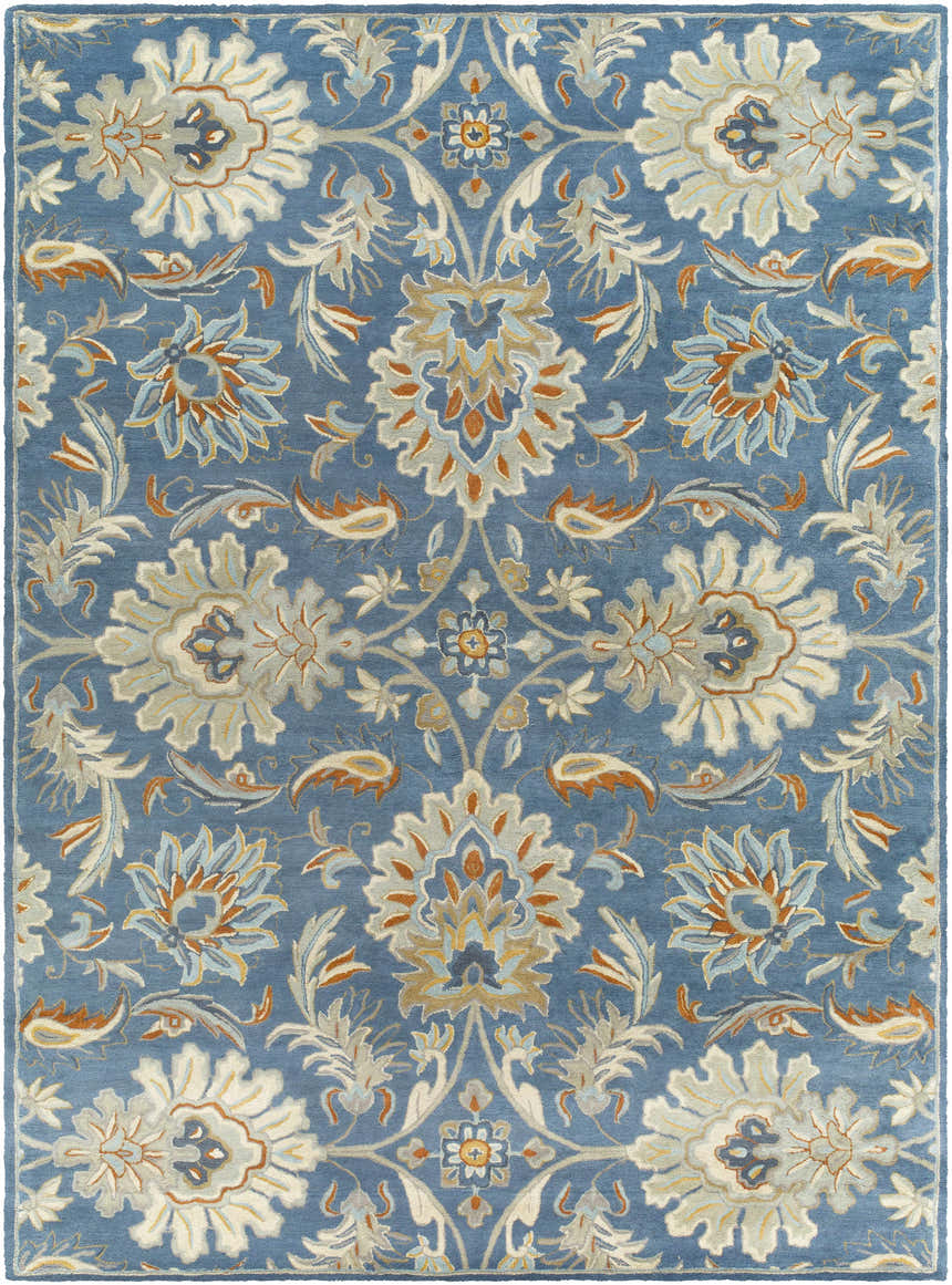 Close-up of the Fanny Area Rug. Hand-tufted wool rug in beachhouse blue with beige, caramel, and copper floral pattern. Design-Rectangle-811