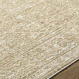 Close-up of the Antoan Sandstone Area Rug showing its ivory, sandstone, and taupe colors and traditional design. Texture
