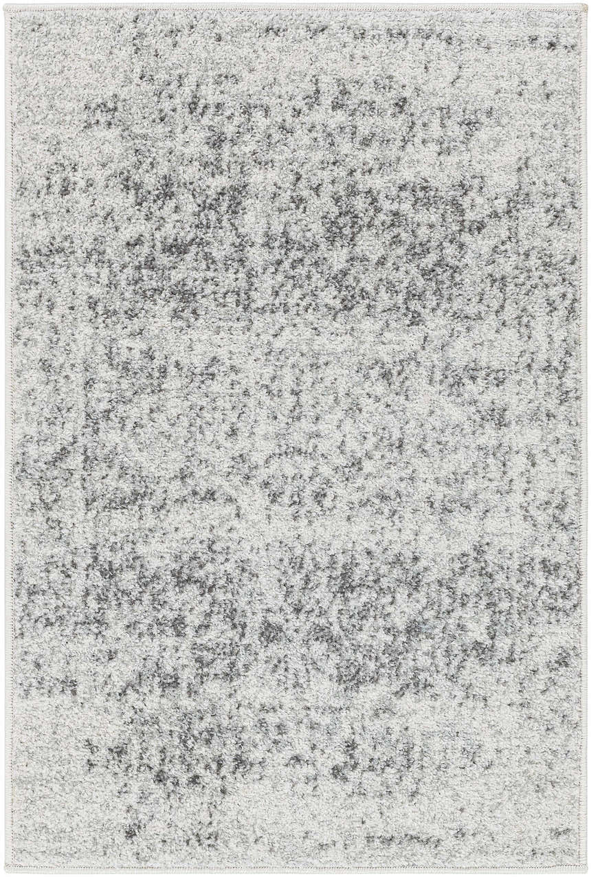 Close-up of Livabliss Harput HAP-1024 area rug. Charcoal and off white farmhouse style rug with a subtle traditional pattern. Design-Rectangle-23