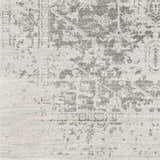 Close-up of the Livabliss Harput HAP-1024 area rug, showcasing its charcoal and off-white traditional pattern and soft texture. Swatch