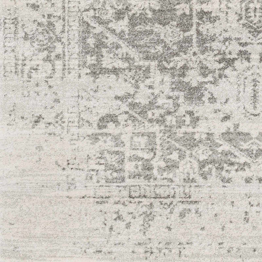 Close-up of the Livabliss Harput HAP-1024 area rug, showcasing its charcoal and off-white traditional pattern and soft texture. Swatch